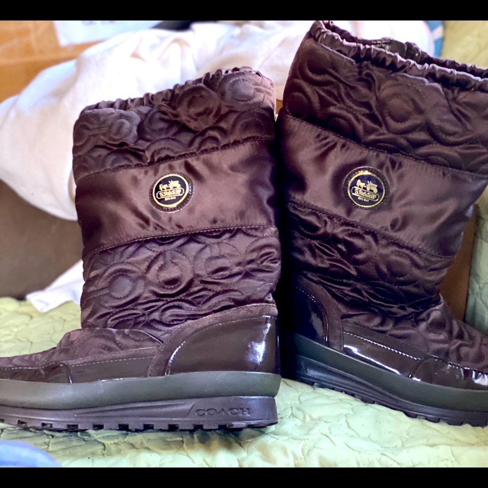 Coach’s brown snow boots.